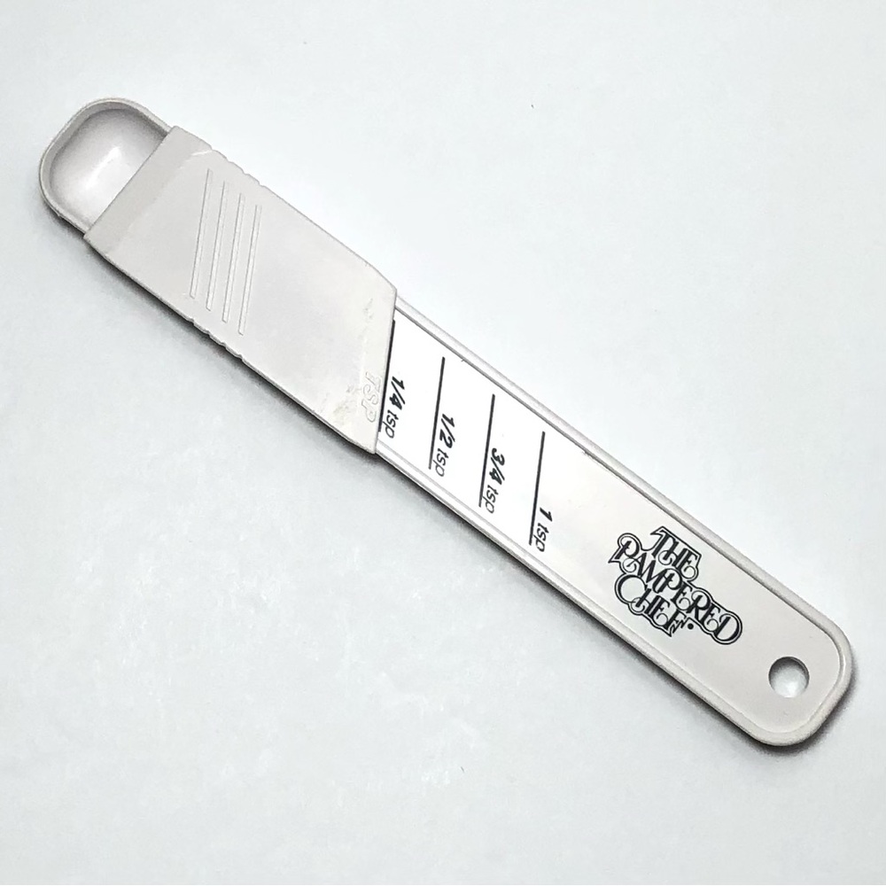Pampered Chef Adjustable Sliding Measuring Spoon 1/8 - 1 Teaspoon Plastic White